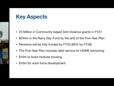 Larry and Denise show slides with key points from the mayor's new budget.